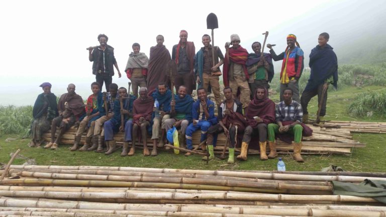 The farmers and their families are ready to start construction for their school!